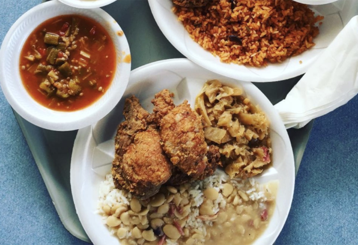 Fried chicken, rice, and sides at Bertha’s Kitchen