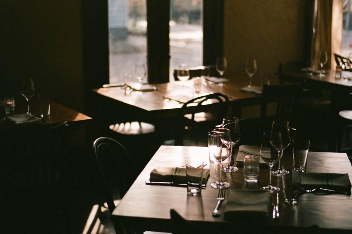 The dining room at Vern’s with candlelit tables