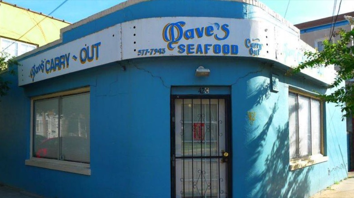 The blue exterior of Dave’s Carry-Out on Morris Street